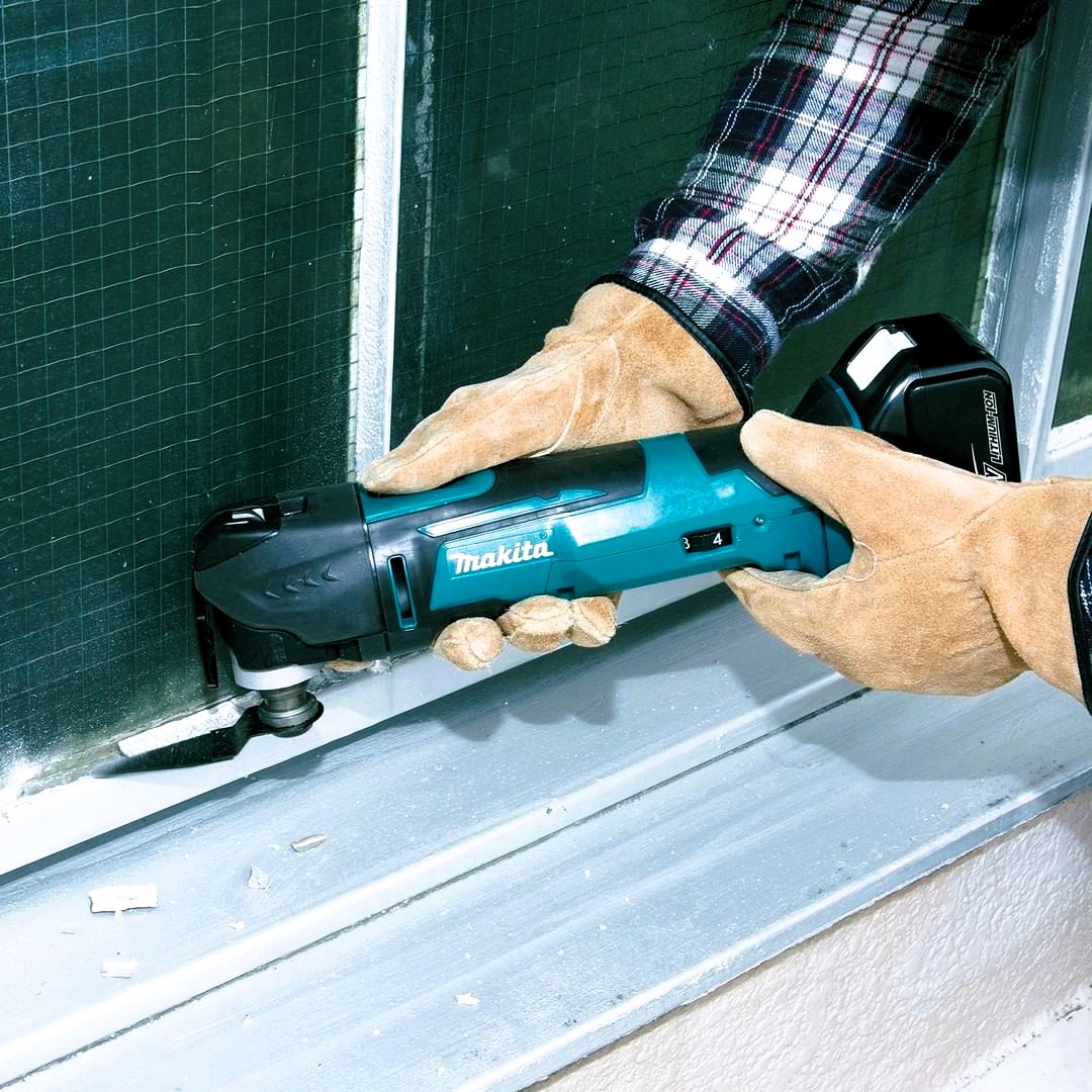 Grout removal using Oscillating Multi tool 135