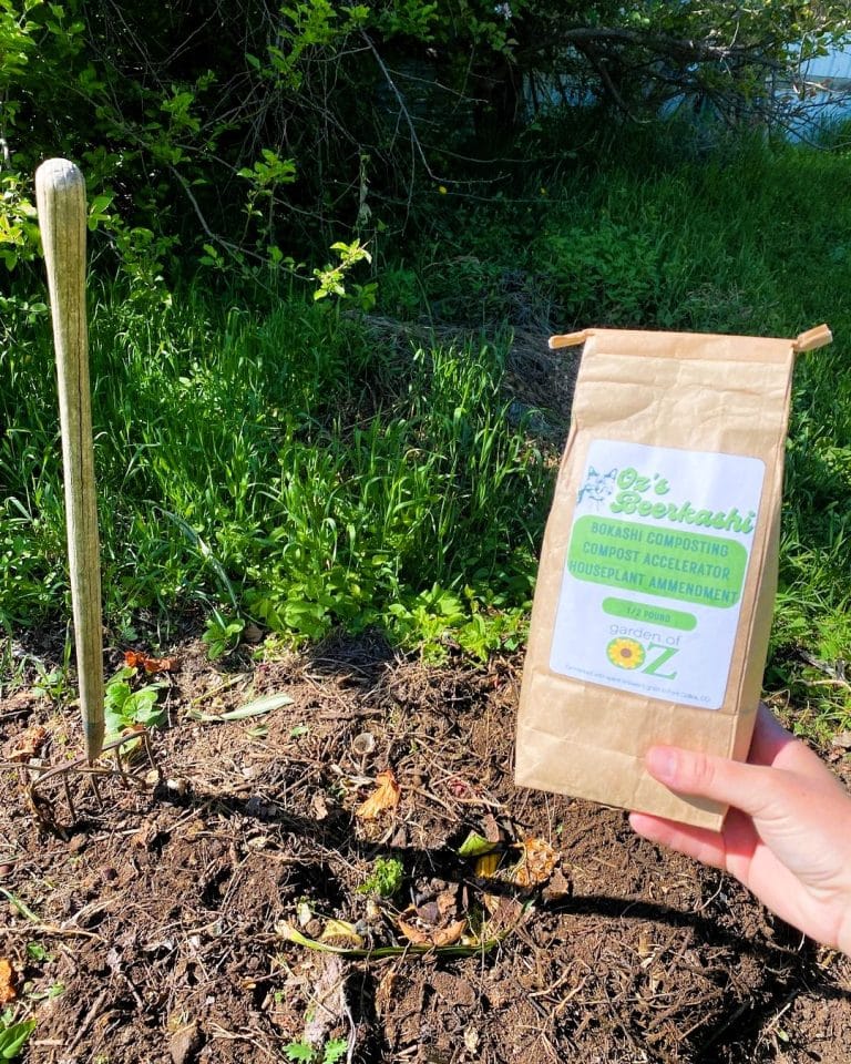 Compost activator in a persons hand 743